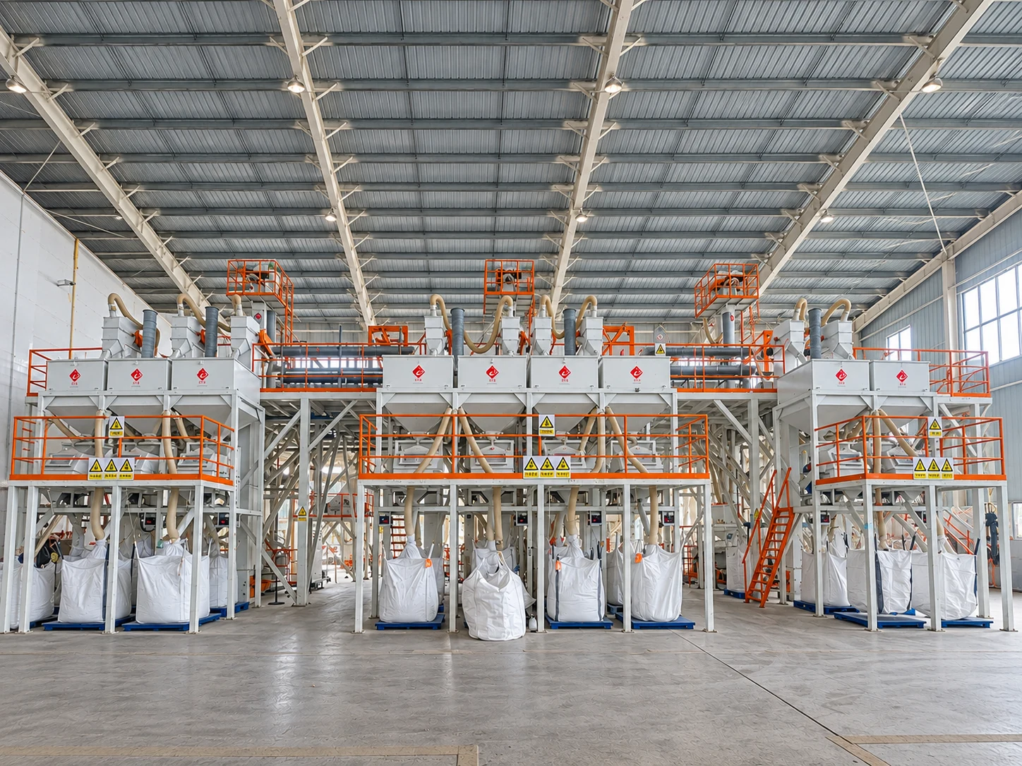 Sand-making workshop with hoppers, platforms and production equipment